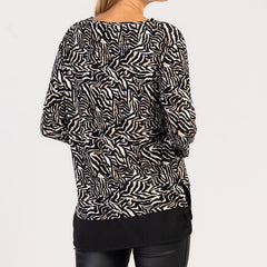 MIRA - ΓΥΝΑΙΚΕΙΟ ΜΟΝΤΕΛΑ ΜΕ ΜΑΚΡΥΜΑΝΙΚΑ ΜΠΛΟΥΖΑΚΙΑ